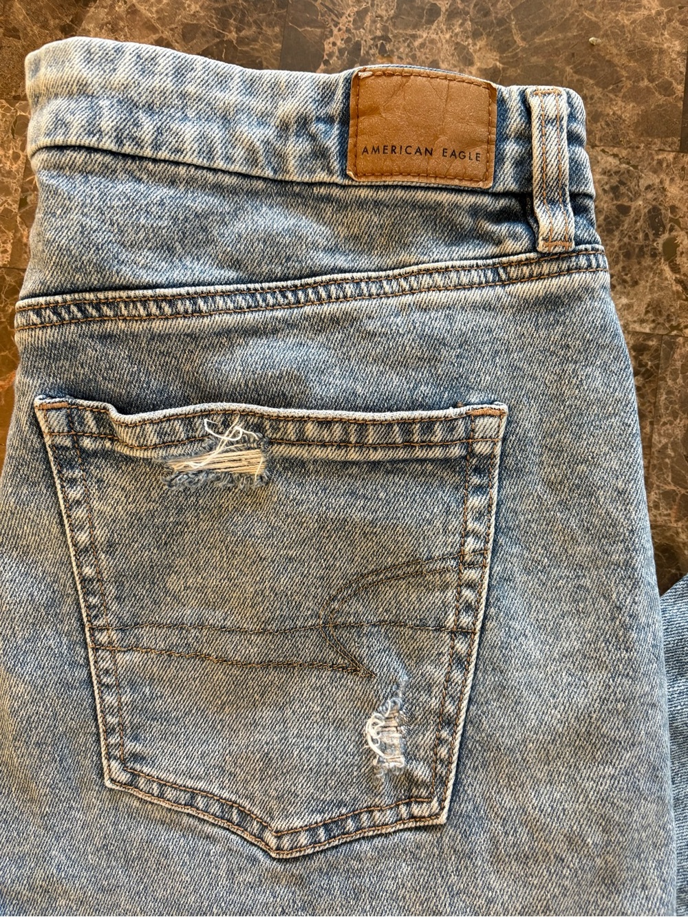 American Eagle Outfitters Curvy Straight Light Blue Ripped Jeans